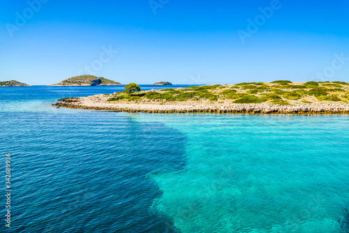 Scenic view of mediterranean lagoon with turquoise water. Adriatic Sea, croatian island coast and beach, Croatia, vacation travel concept.