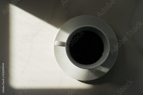 Top view of cup with black coffee