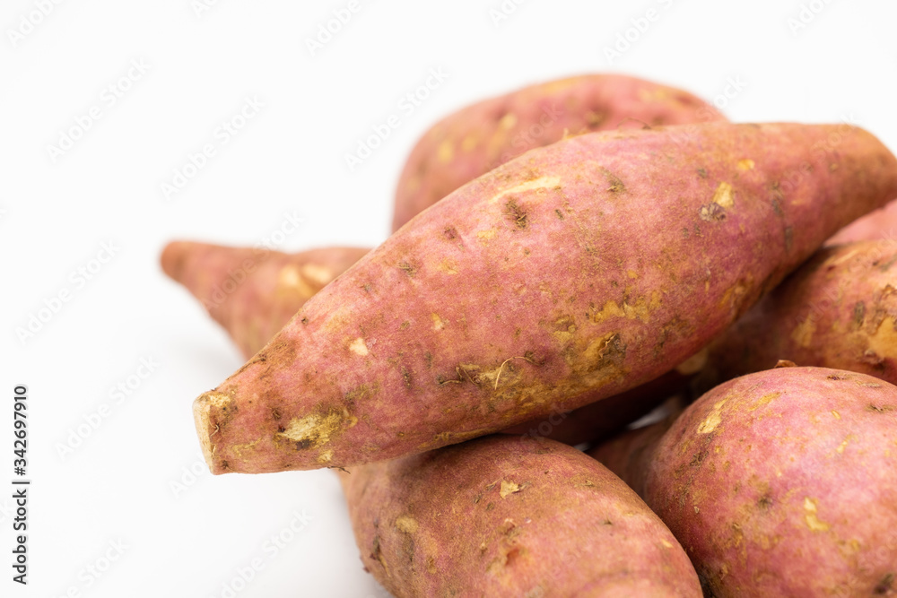 Pile of Japanese potato isolated on white background Pile of Japanese potato isolated on white background