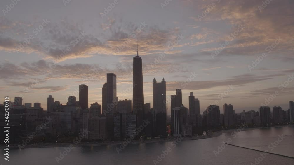 aerial drone view of the chicago skyline at dusk