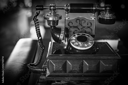 Black and white Vintage wooden telephone. Old fashion telephone