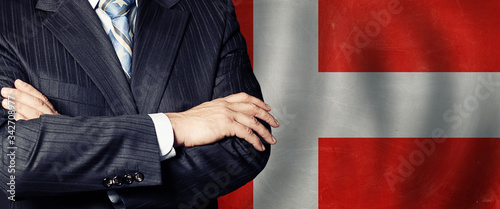 Male hands against Danish flag background, business, politics and education in Denmark concept