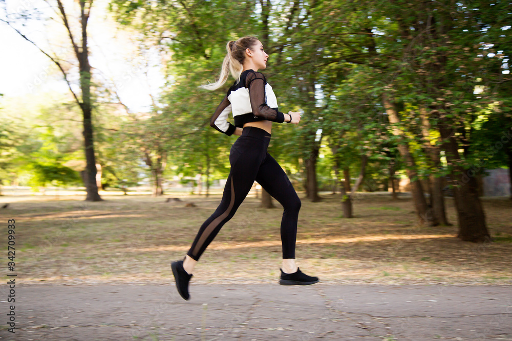 Young woman Jogging in the Park Young woman Jogging in the Park