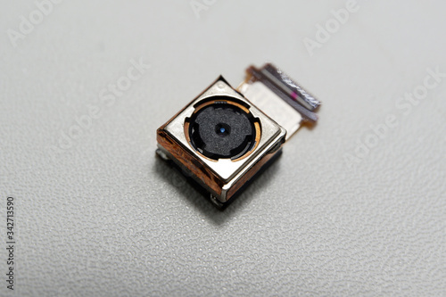 Smartphone camera detached with white background
