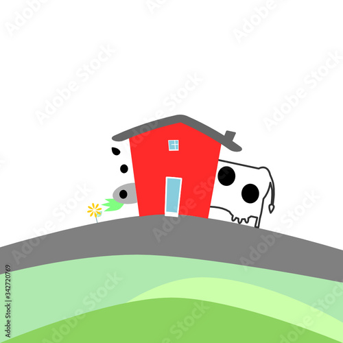 house on a hill and big cow behind the house