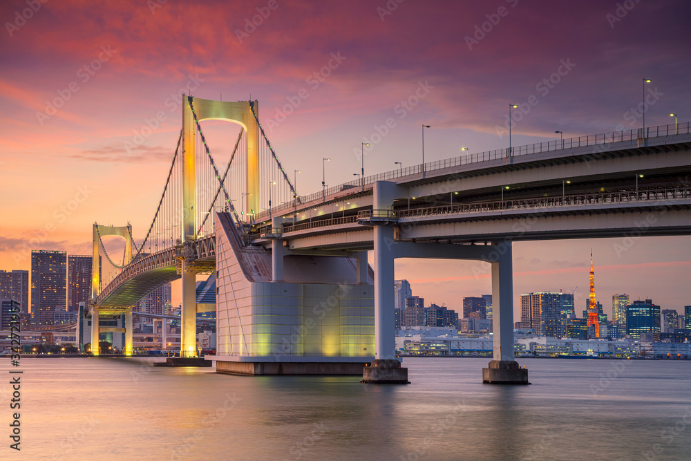 Tokyo. Cityscape image of Tokyo, Japan with Rainbow Bridge during sunset. Tokyo. Cityscape image of Tokyo, Japan with Rainbow Bridge during sunset.