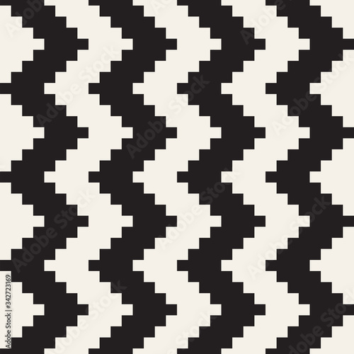 Vector seamless pattern. Ethnic stylish abstract texture. Repeating geometric tiles from striped zig zag elements
