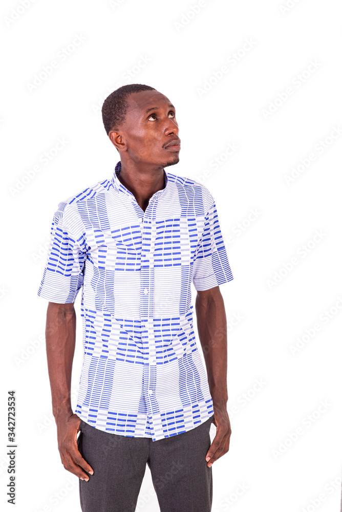 young man looking up. young man looking up.