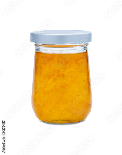 orange fruit jams in clear glass bottle isolated on white background