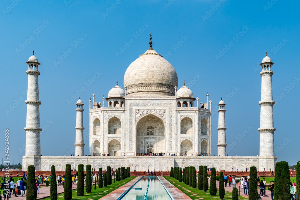 Agra, Uttar Pradesh, India- Feb, 2020 : Taj Mahal and it's reflection on the water, Agra, Uttar Pradesh, India