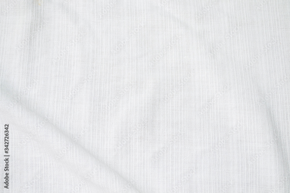 White linen fabric texture Creased or background. White linen fabric texture Creased or background.