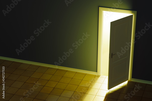 ajar door and light through it into a dark room.