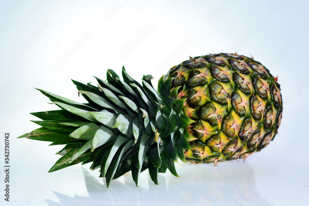 A fresh green ripe pineapple on a white backgrownd big size high resolution A fresh green ripe pineapple on a white backgrownd big size high resolution