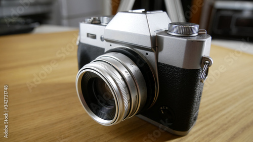 Silver vintage camera with modern features