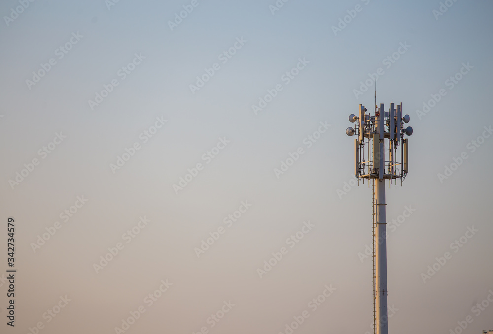 A Large Communications Tower on a Blue Sky. A Large Communications Tower on a Blue Sky.