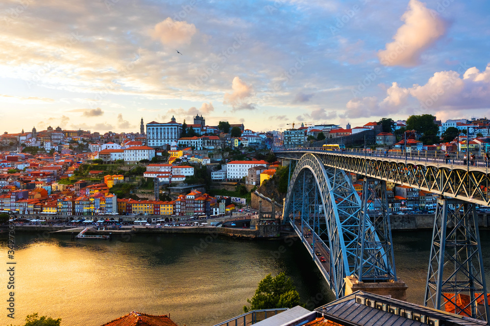 Aerial view of Ribeira area in Porto, Portugal during a sunny evening with river