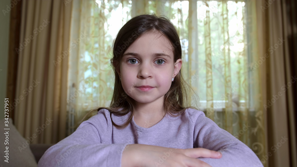 Little girl having a video call at home Little girl having a video call at home