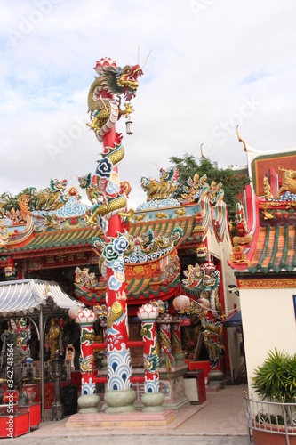 Colored column with twisted dragon and lots of decoration