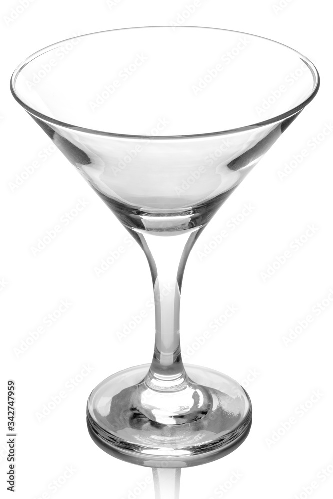 Martini glass on a white glossy background isolation Martini glass on a white glossy background isolation