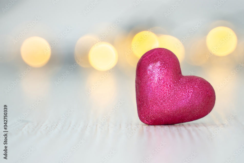Obraz premium Pink glitter heart shaped bokeh background