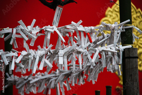 Prayers in a shrine in tokyo photo