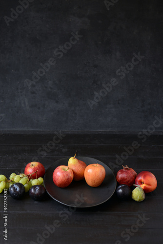 Fototapeta Naklejka Na Ścianę i Meble -  fruits on table, apple and grapefruit