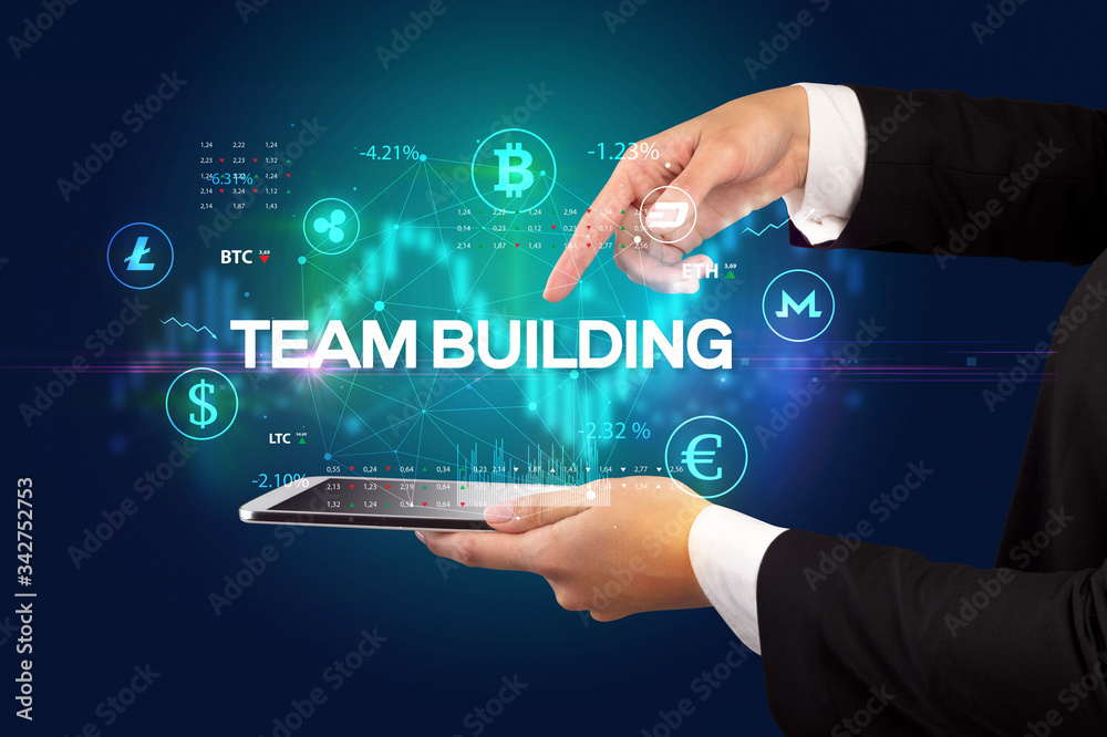 Obraz premium Close-up of a touchscreen with TEAM BUILDING inscription, business opportunity concept