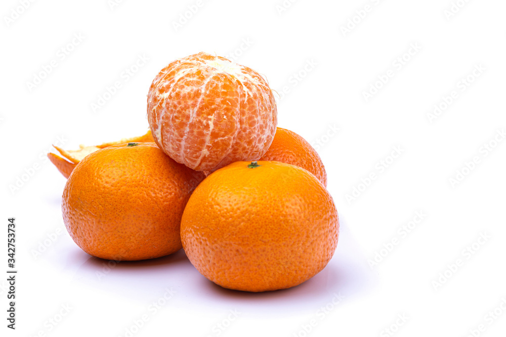 ripe tangerines on a white isolated background, close-up, a place for text ripe tangerines on a white isolated background, close-up, a place for text
