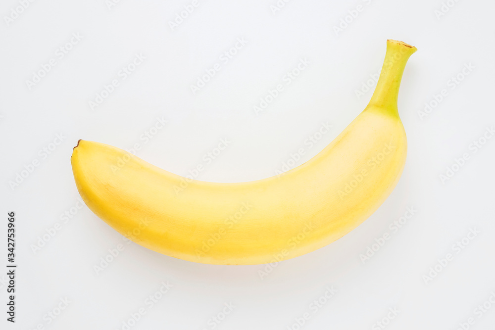 one ripe yellow banana on a white background isolate one ripe yellow banana on a white background isolate