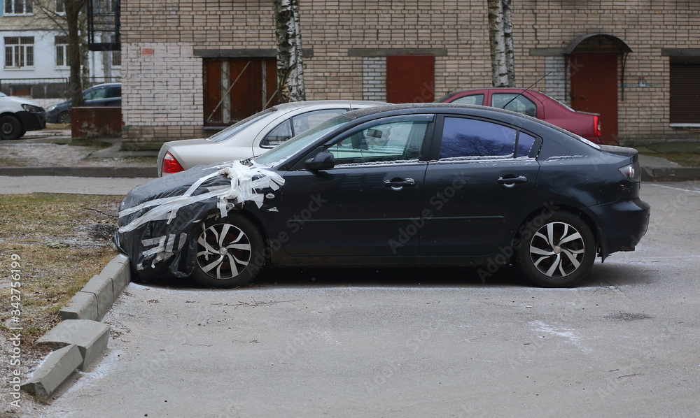 Taped car after an accident, prospekt Bolshevikov, Saint Petersburg, Russia, February 2020