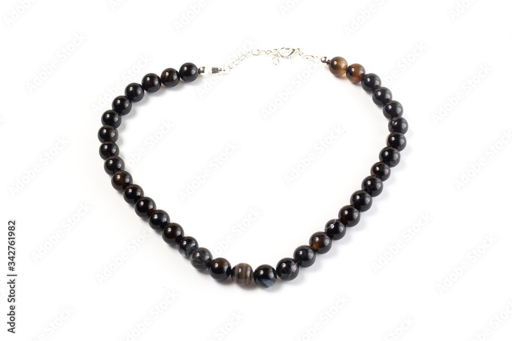 natural agate beads on a white background isolate natural agate beads on a white background isolate