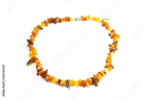 natural amber beads on a white background isolate