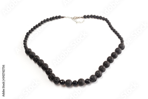 natural lava beads on a white background isolate