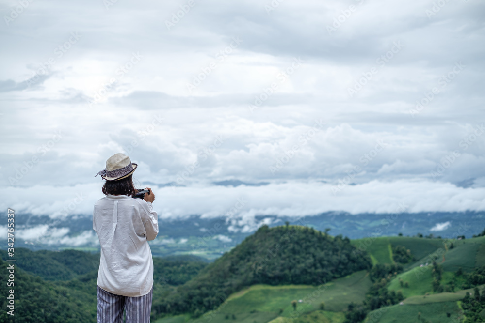 A resort beside rice fields and mountains during the rainy season in Mae La Noi District, Mae Hong Son Province of Thailand. A resort beside rice fields and mountains during the rainy season in Mae La Noi District, Mae Hong Son Province of Thailand.