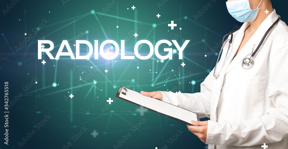 Doctor fills out medical record with RADIOLOGY inscription, medical concept Doctor fills out medical record with RADIOLOGY inscription, medical concept