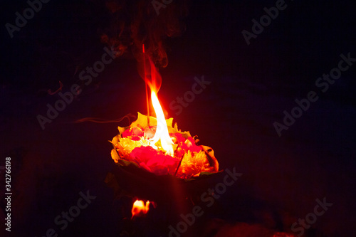 Aarti ceremony flowers with fire in Ganga river