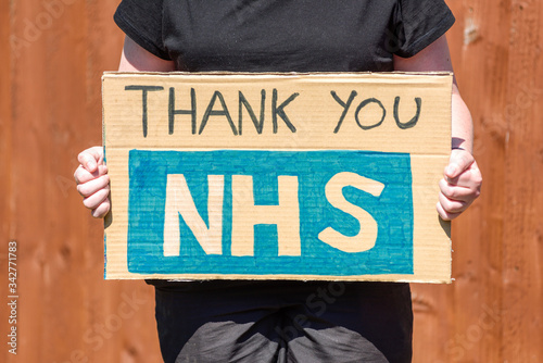 Message on cardboard Thanking the NHS 'National Health Service' during a global pandemic Coronavirus. photo