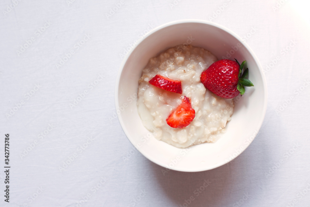 oatmeal porridge with strawberries for Breakfast