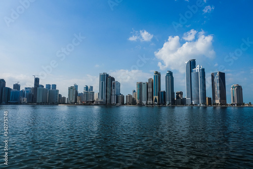 Panorama of the center of the Emirate of Sharjah, United Arab Emirates . Walking area in the UAE city. Real estate in United Arab Emirates . © Евгений Симдянкин