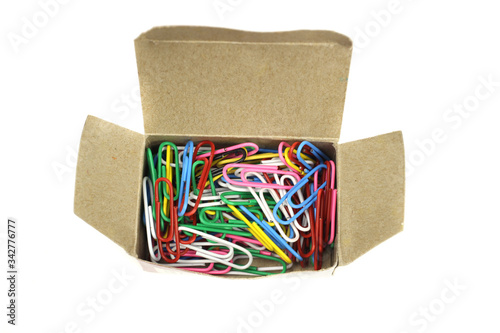 Box of paper clips stationery color isolated on white
