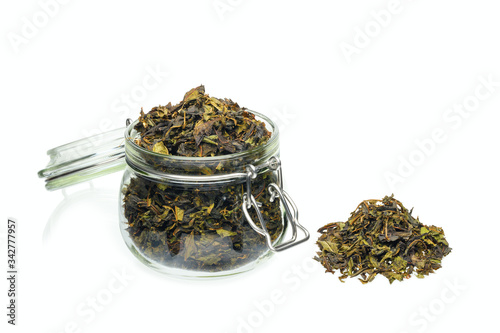 Slika na platnu Ivan tea dried in a glass jar isolated on a white background.