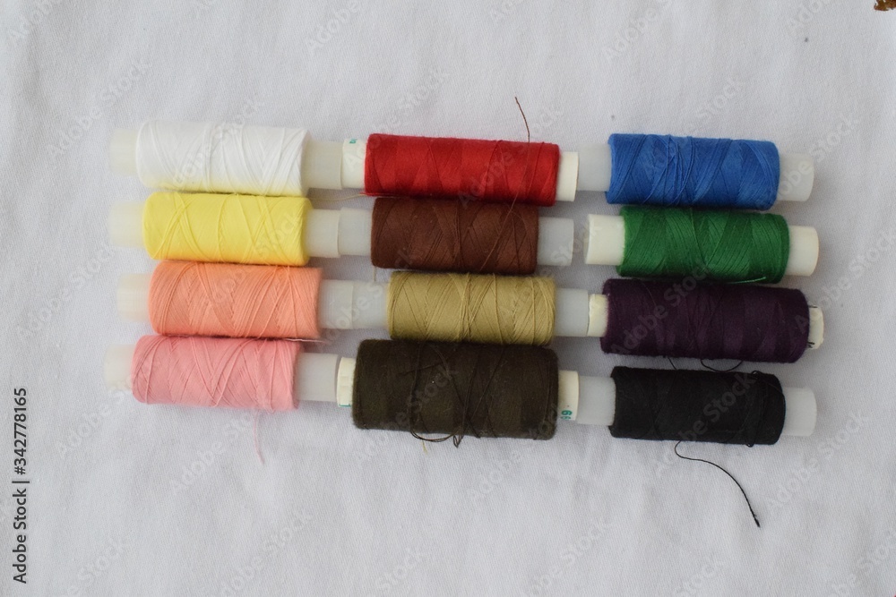 A set of threads on a white background. A set of threads on a white background.