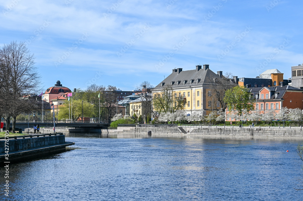 Norrkoping waterfront Saltangen and Motala stream on a sunny spring day in Aril 2020. Norrkoping is a historic industrial town in Sweden.