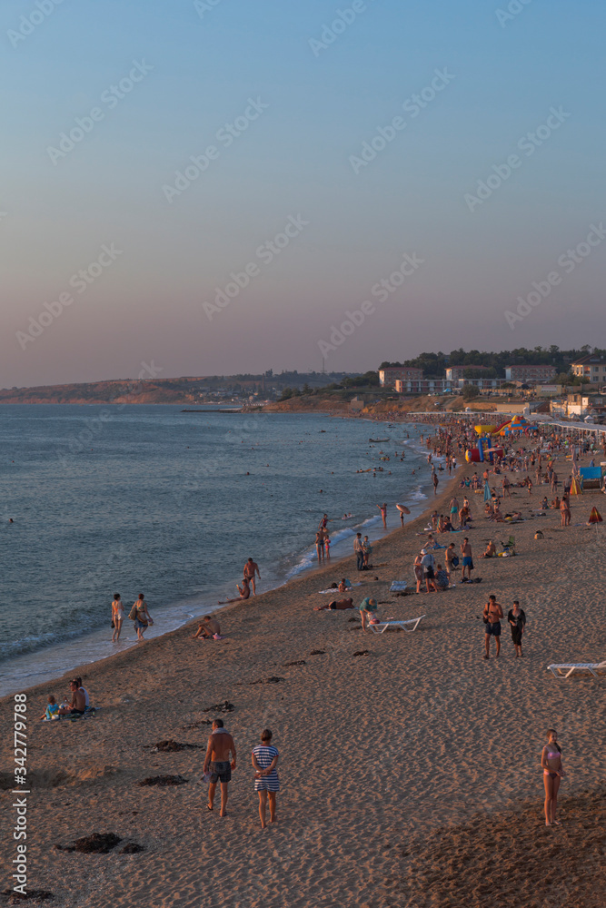 Evening on the Uchkuevka beach in the city of Sevastopol, Crimea
