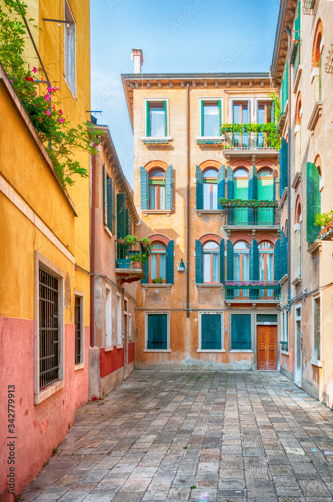 Fototapeta premium Narrow Street in old Venice, Italy
