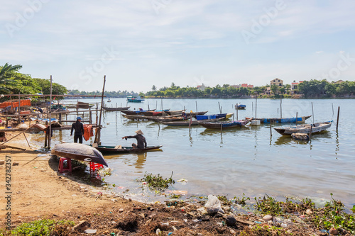 Panorama Aerial view of Hoi An ancient town, UNESCO world heritage, at Quang Nam province. Vietnam. Hoi An is one of the most popular destinations in Vietnam. Boat on Hoai river photo