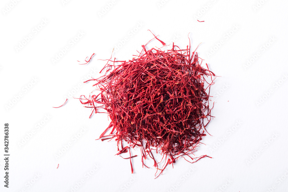 Naklejka premium Dried saffron spice isolated on white background.