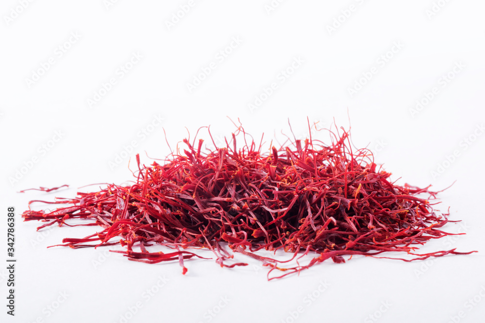 Fototapeta premium Dried saffron spice isolated on white background.