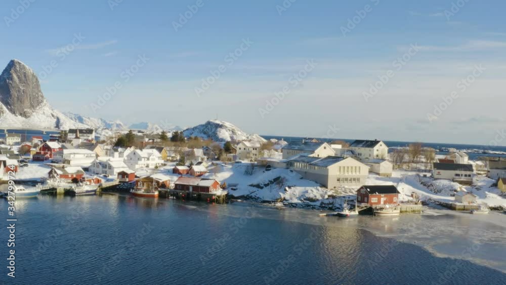 morning Reine aerial panorama with the beautiful red sunrise and snow covered mountains of Lofoten archipelago
morning Reine aerial panorama with the beautiful red sunrise and snow covered mountains of Lofoten archipelago