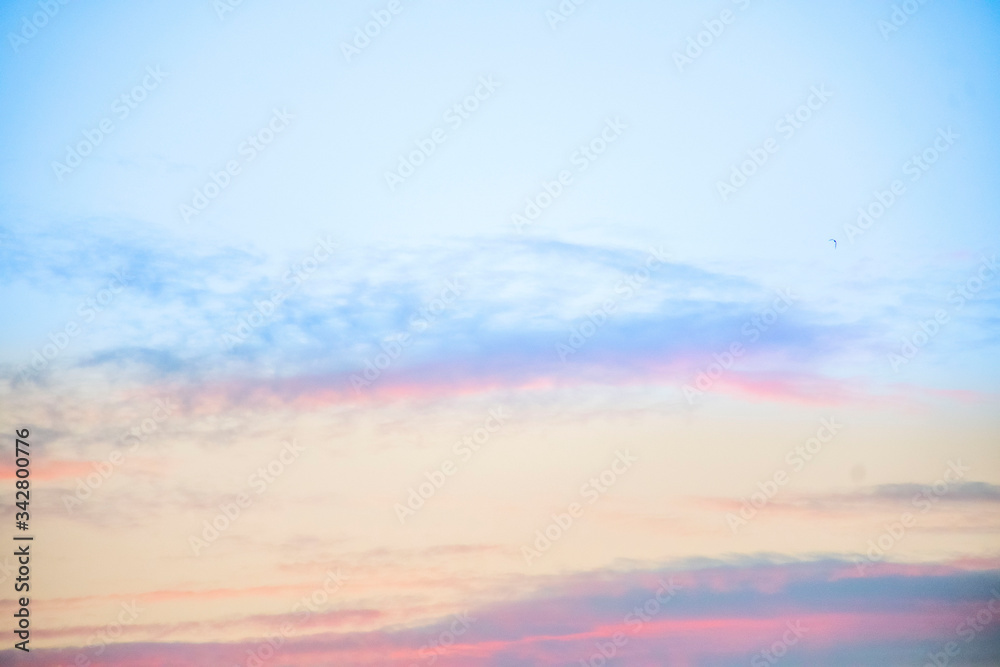 sky background with tiny clouds.